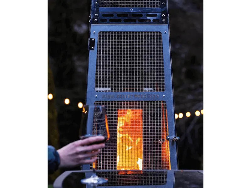 Pellet patio heater with a wine and glass in front of it