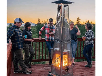 People having drinks around the big timber elite patio pellet heater on a deck